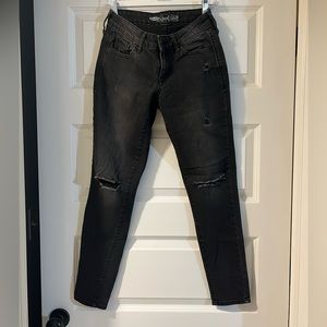 Women’s black jeans distressed